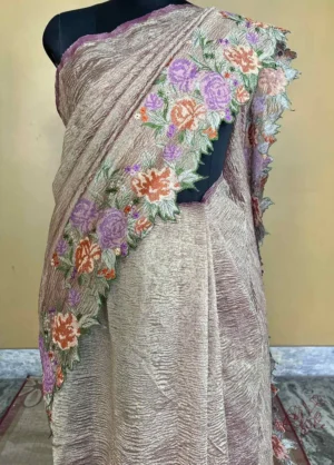 Wine on crush cutwork border with tussles on Tissue saree