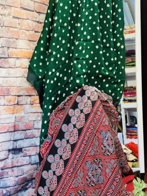 Green Bandhani and anchal Ajrakh on Modal Silk saree