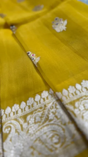 Yellow color with golden zari border tissue Banarasi with Meena work