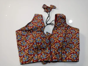 Florals on Brick Red Printed V Neck Sleeveless Blouse