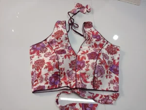 Florals on Off White Printed V Neck Sleeveless Blouse