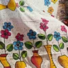 White Batik print on multicolor floral work Khadi saree