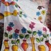 White Batik print on multicolor floral work Khadi saree