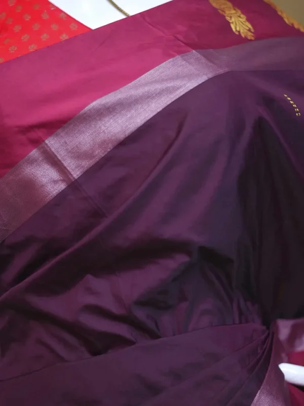 Chocolate color with maroon border kanjivaram work on Satin Silk Saree