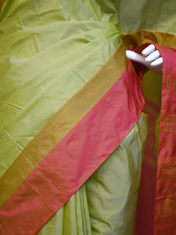Light green color with red border kanjivaram work on Satin Silk Saree