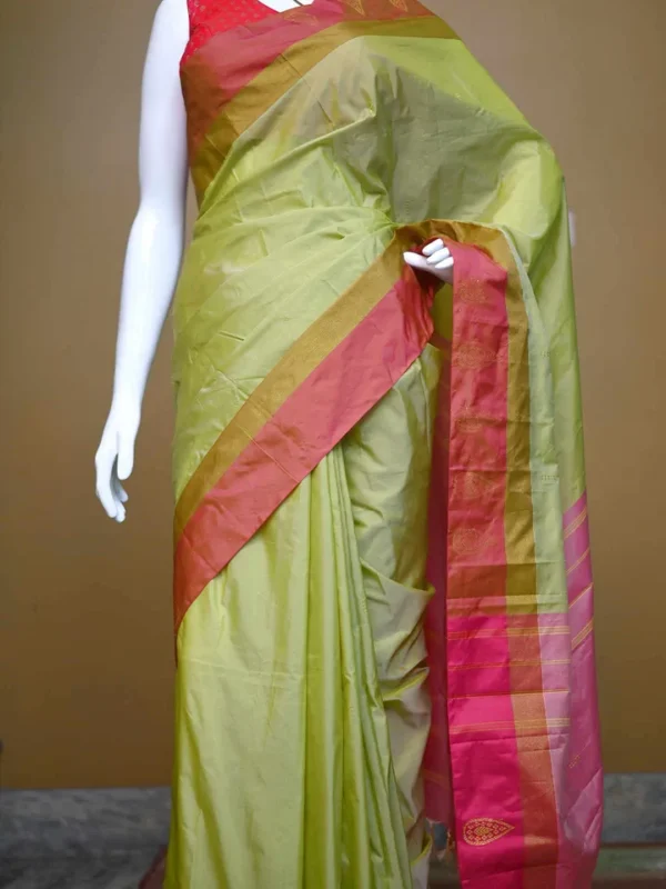 Light green color with red border kanjivaram work on Satin Silk Saree