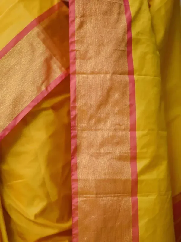 Yellow color with pink border kanjivaram work on Satin Silk Saree