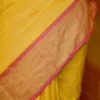 Yellow color with pink border kanjivaram work on Satin Silk Saree