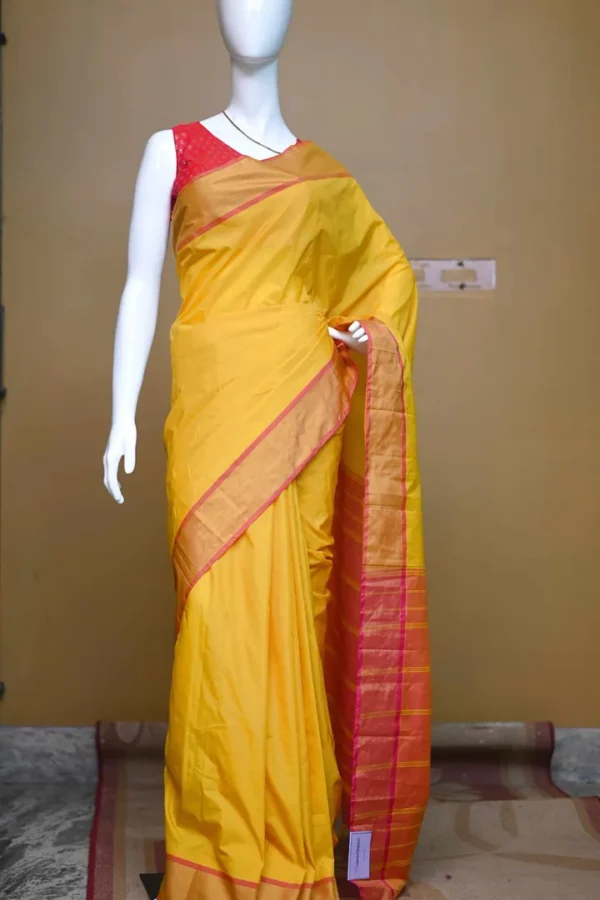 Yellow color with pink border kanjivaram work on Satin Silk Saree