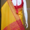 Yellow color with pink border kanjivaram work on Satin Silk Saree