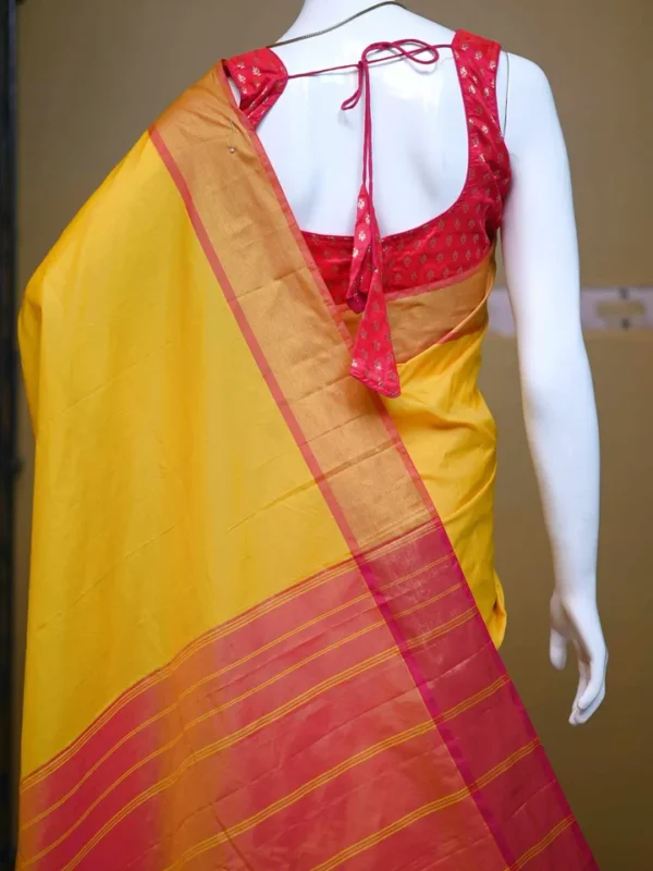 Yellow color with pink border kanjivaram work on Satin Silk Saree
