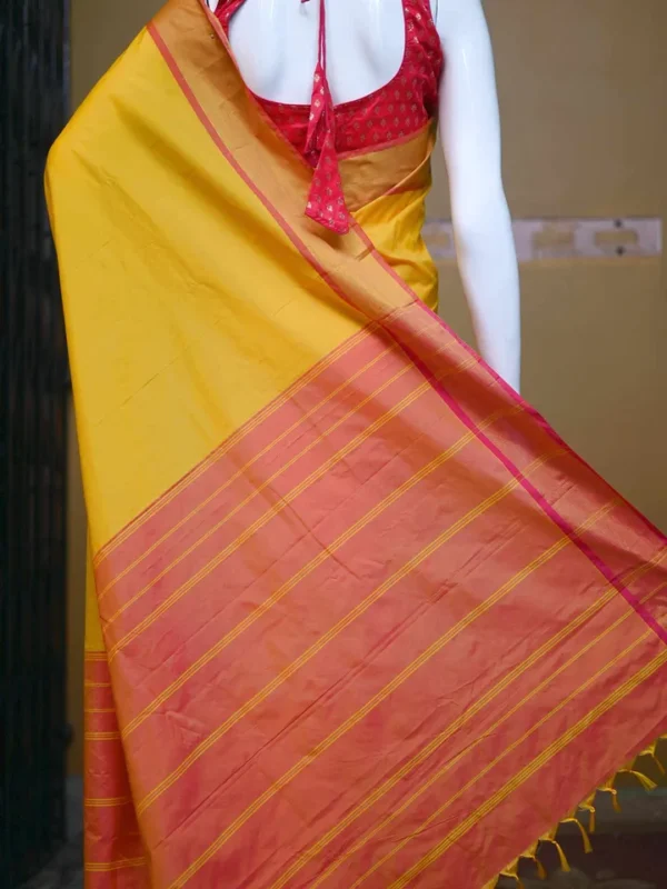 Yellow color with pink border kanjivaram work on Satin Silk Saree