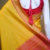 Yellow color with pink border kanjivaram work on Satin Silk Saree