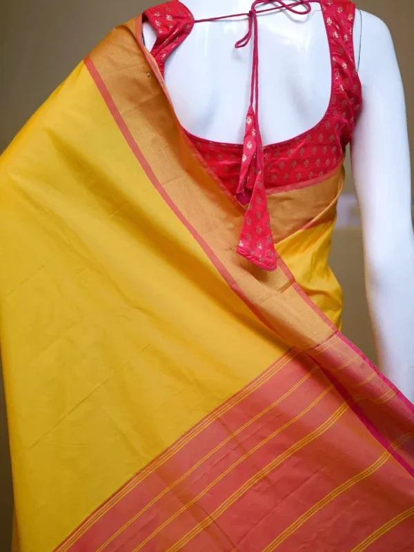 Yellow color with pink border kanjivaram work on Satin Silk Saree