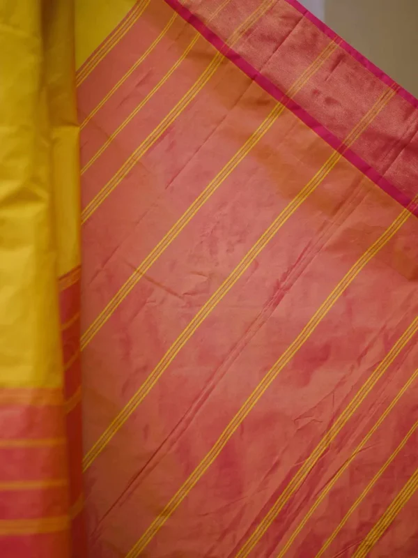 Yellow color with pink border kanjivaram work on Satin Silk Saree