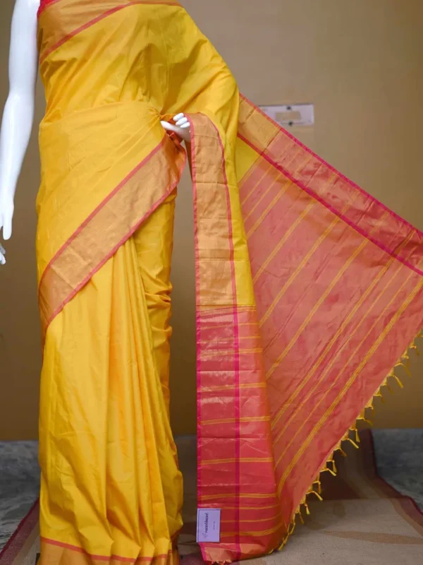 Yellow color with pink border kanjivaram work on Satin Silk Saree
