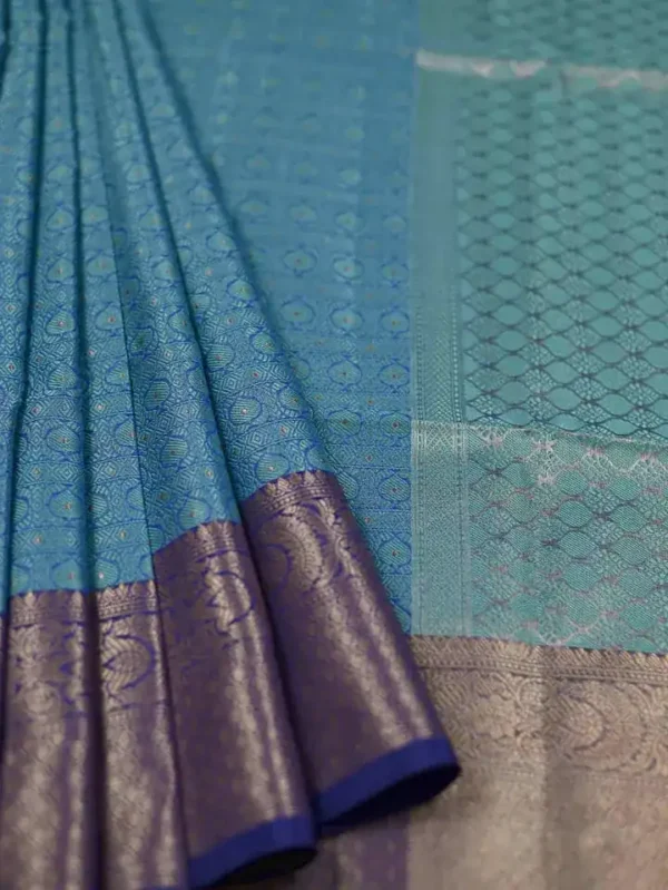 Aqua Blue with Golden Border Tanchuee work on Kora silk saree