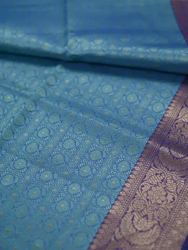 Aqua Blue with Golden Border Tanchuee work on Kora silk saree