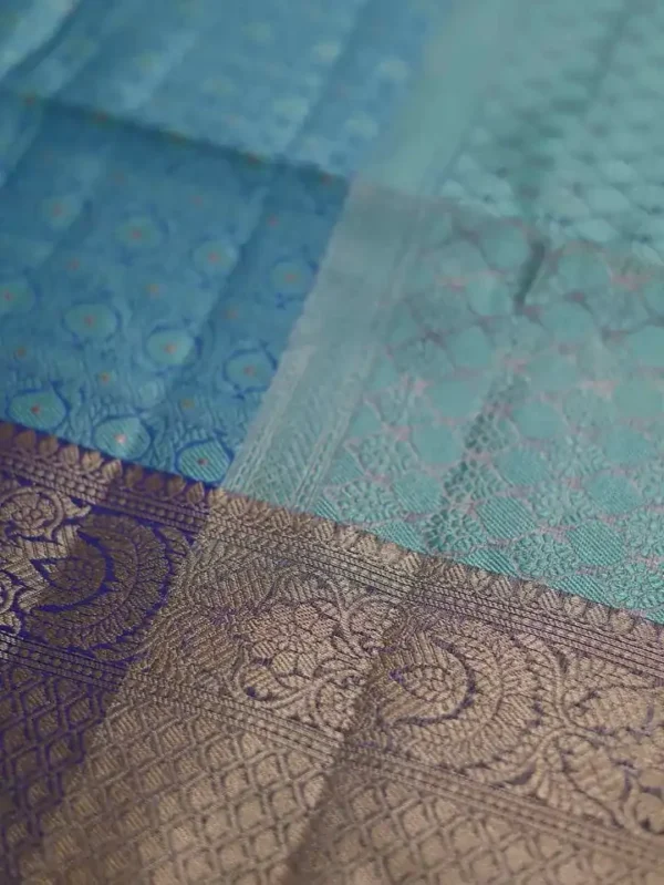 Aqua Blue with Golden Border Tanchuee work on Kora silk saree