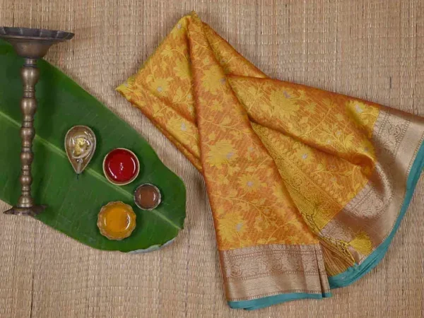 Yellow with Green Border Tanchuee work on Kora silk saree