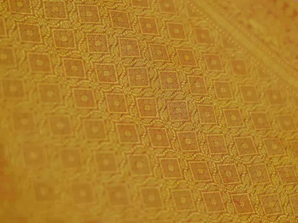 Yellow with Green Border Tanchuee work on Kora silk saree