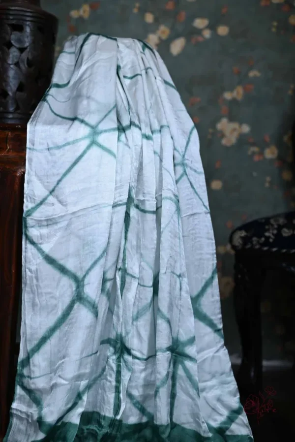 Dark Green and White Clamp Dye Zari anchal Modal Silk Saree