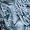 Dark Green and White Clamp Dye Zari anchal Modal Silk Saree