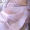 Peach parsi embroidery cut work border Organza silk saree