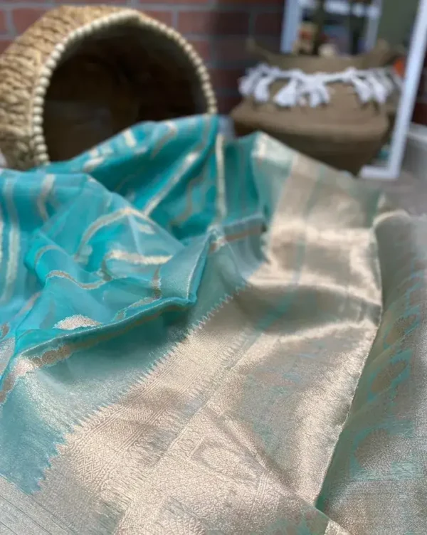 Cyan blue body with golden zari Organza silk saree