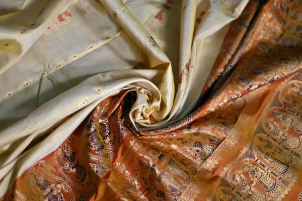 Biscuit on Red n Golden Zari work n Red anchal Baluchuri Pure Silk saree