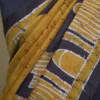 Mustard yellow on Black Hand Batik Print Pure silk saree