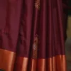 Brown color with green border kanjivaram work on Pure silk saree