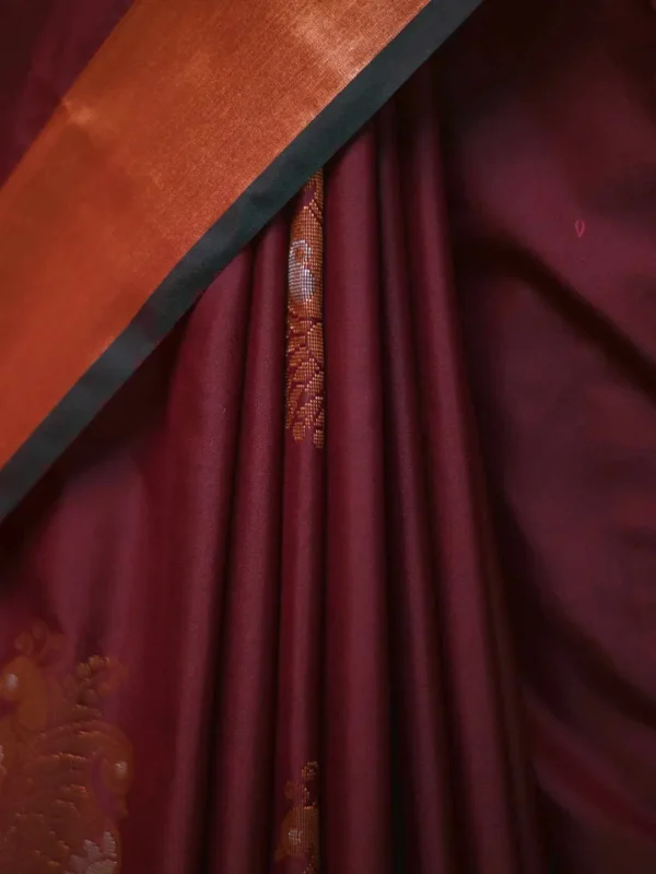 Brown color with green border kanjivaram work on Pure silk saree