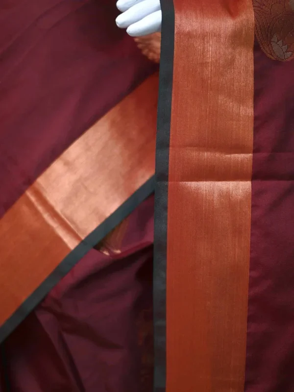 Brown color with green border kanjivaram work on Pure silk saree