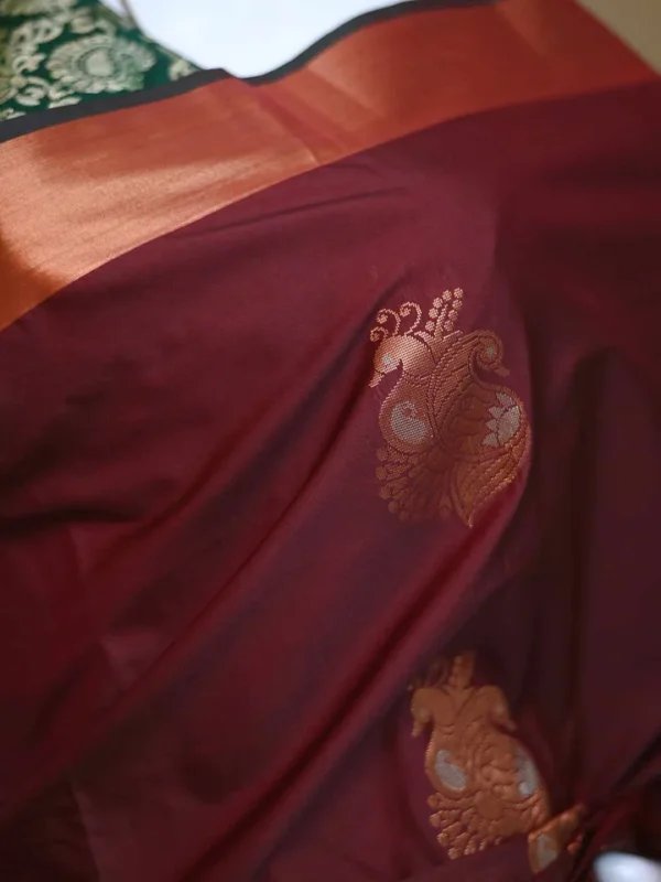 Brown color with green border kanjivaram work on Pure silk saree