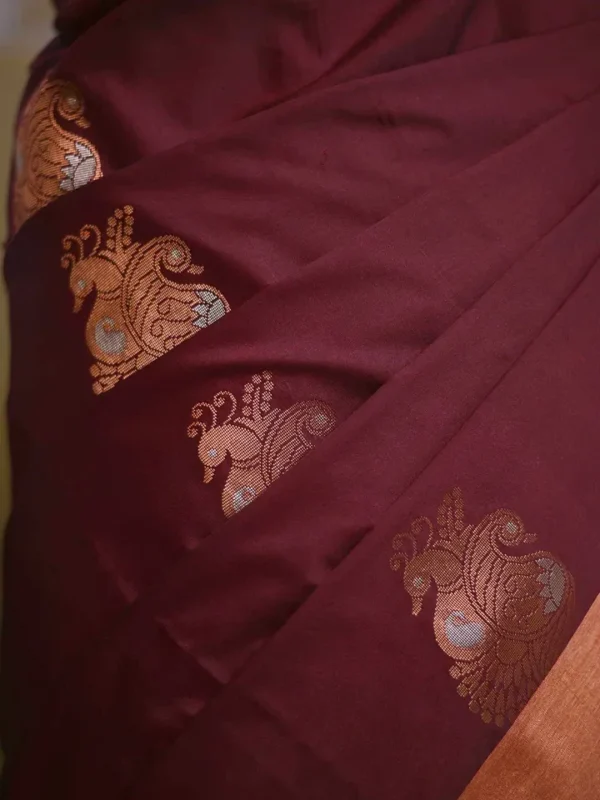 Brown color with green border kanjivaram work on Pure silk saree