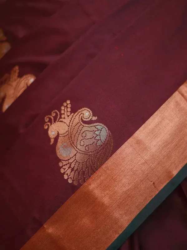 Brown color with green border kanjivaram work on Pure silk saree