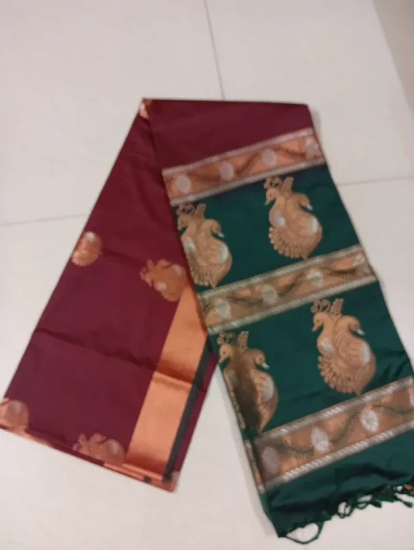 Brown color with green border kanjivaram work on Pure silk saree