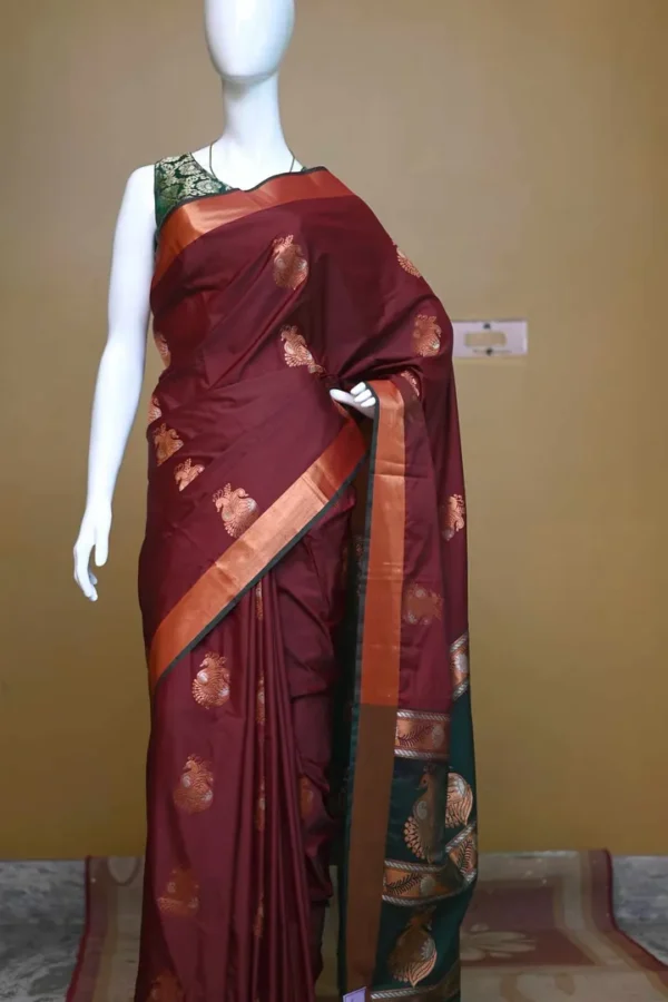 Brown color with green border kanjivaram work on Pure silk saree