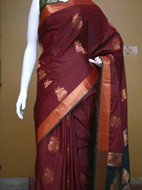 Brown color with green border kanjivaram work on Pure silk saree