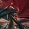 Brown color with green border kanjivaram work on Pure silk saree
