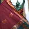 Brown color with green border kanjivaram work on Pure silk saree