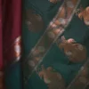 Brown color with green border kanjivaram work on Pure silk saree