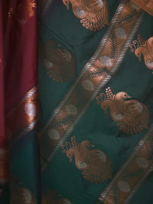 Brown color with green border kanjivaram work on Pure silk saree