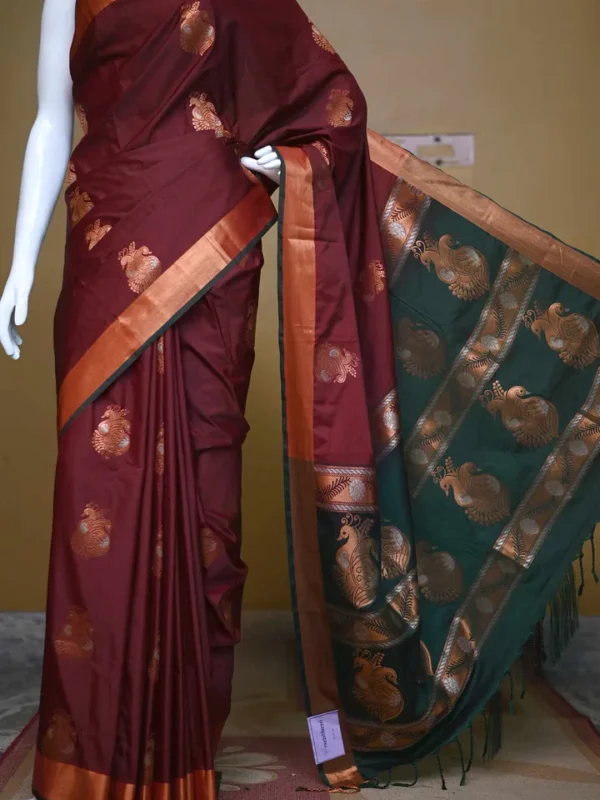 Brown color with green border kanjivaram work on Pure silk saree