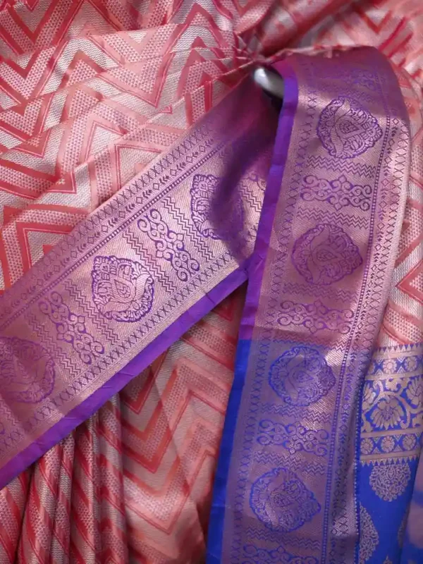Rust color with blue border kanjivaram work on Pure silk saree