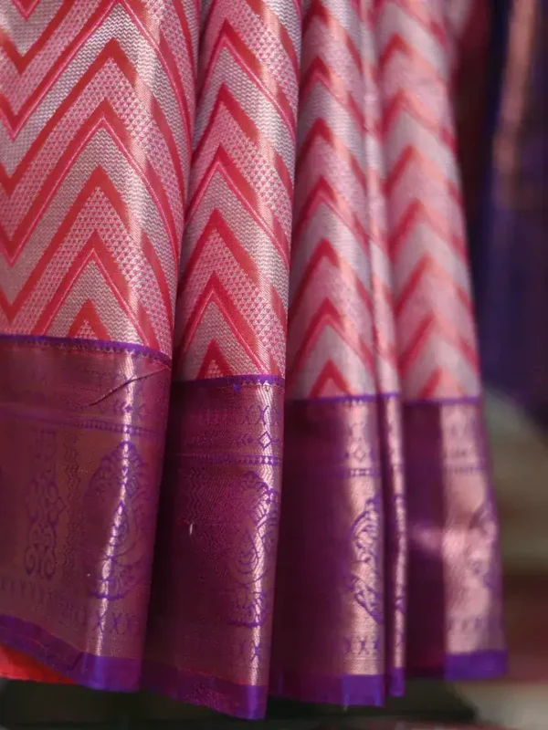 Rust color with blue border kanjivaram work on Pure silk saree