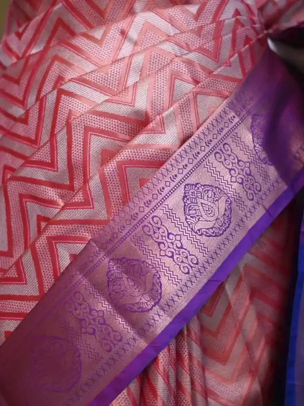 Rust color with blue border kanjivaram work on Pure silk saree