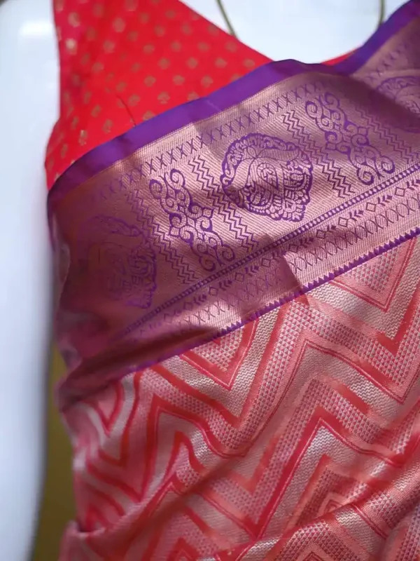 Rust color with blue border kanjivaram work on Pure silk saree