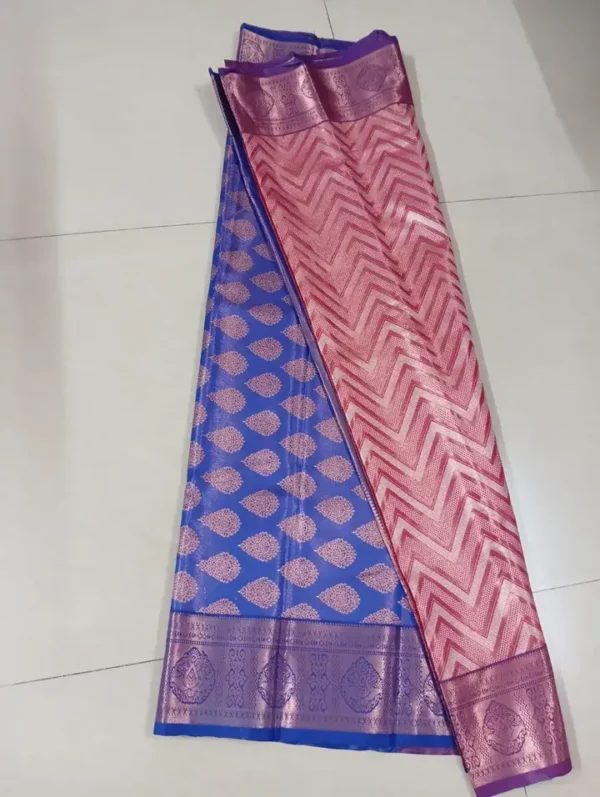 Rust color with blue border kanjivaram work on Pure silk saree